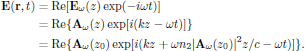 $$
  \eqalign{
    {\bf E}({\bf r},t)&=\Re[{\bf E}_{\omega}(z)\exp(-i\omega t)]\cr
      &=\Re\{{\bf A}_{\omega}(z)\exp[i(kz-\omega t)]\}\cr
      &=\Re\{{\bf A}_{\omega}(z_0)
          \exp[i(kz+\omega n_2 |{\bf A}_{\omega}(z_0)|^2 z/c-\omega t)]\}.\cr
  }
$$